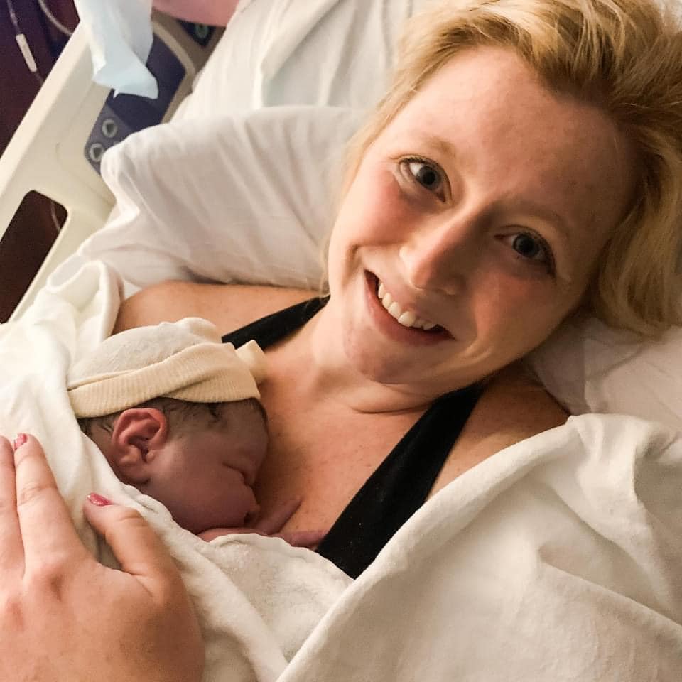 lindsey holding newborn after birth