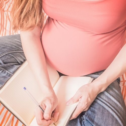 woman writing birth plan